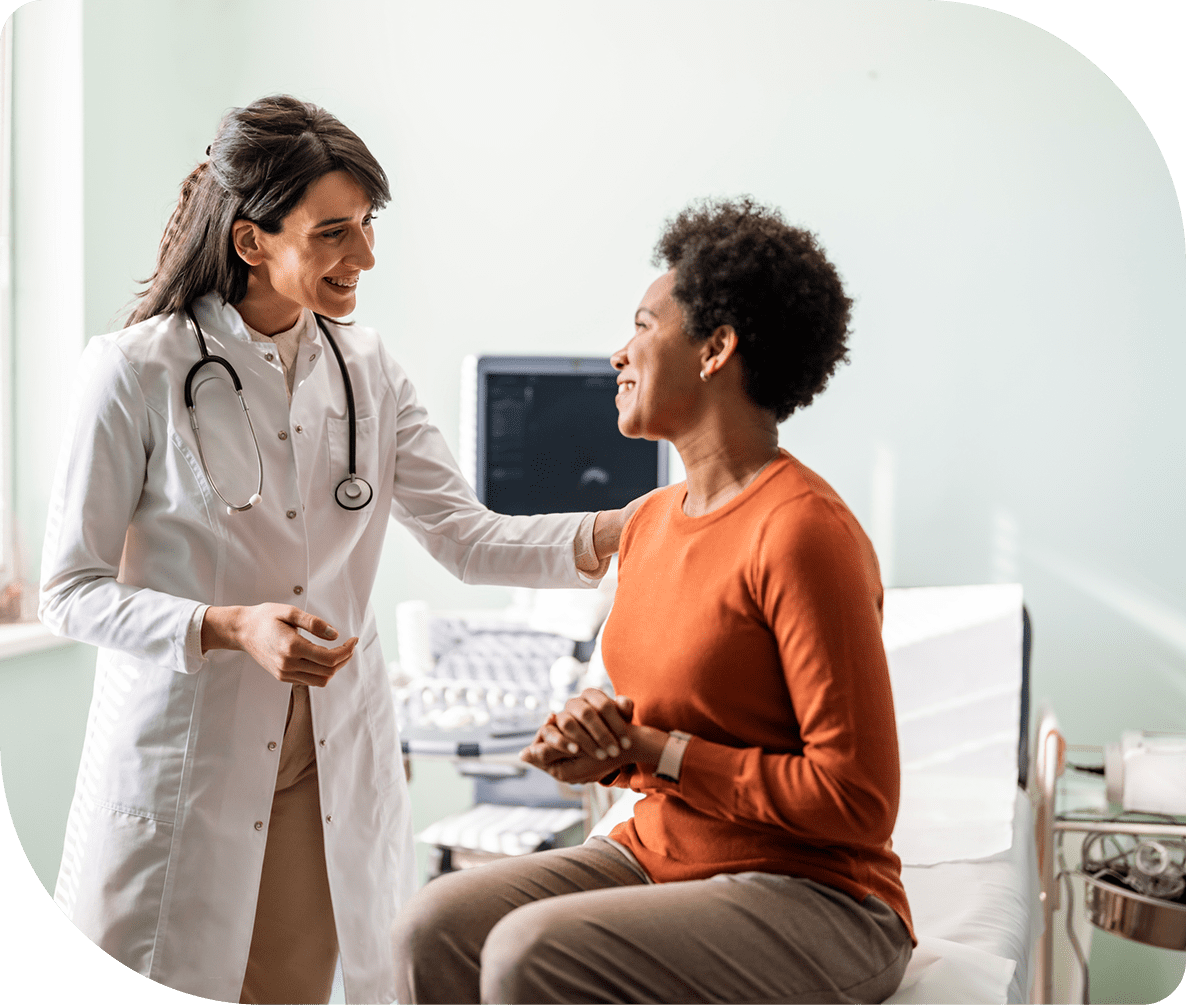 Doctor consulting with a patient in office.